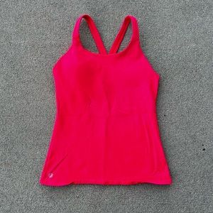 Women’s bright pink Athleta athletic tank top with built in bra
